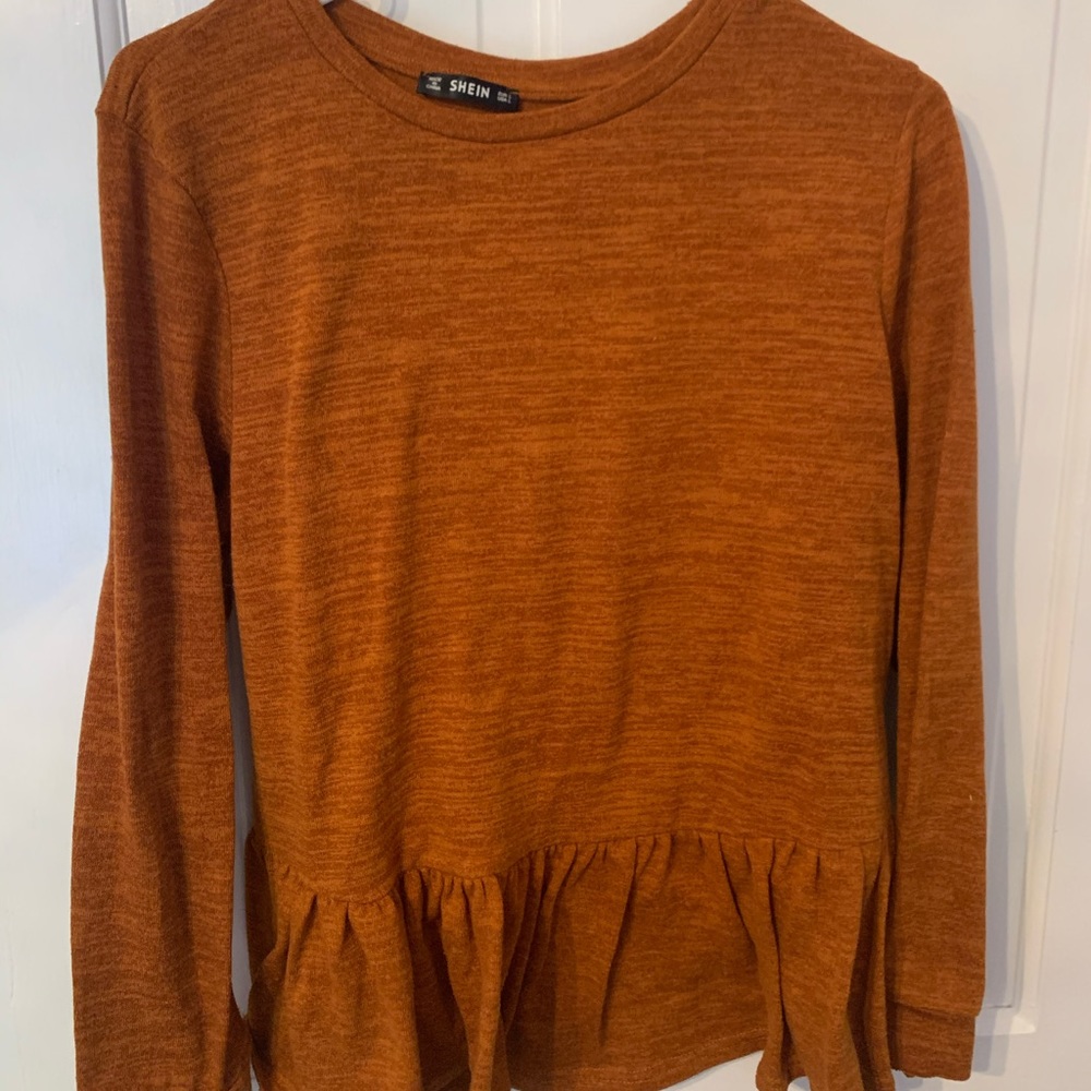 Bunrt orange peplum sweater
